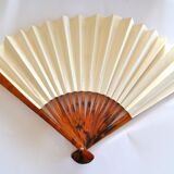 Vintage bamboo fan with floral decoration from China.