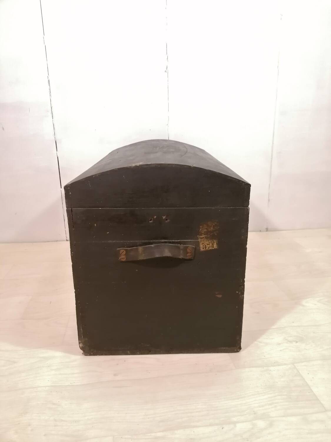 Large travel trunk in blackened wood