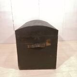 Large travel trunk in blackened wood