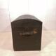 Large travel trunk in blackened wood