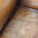 Especially comfortable wingback chair made of sheepskin leather, stunning colors