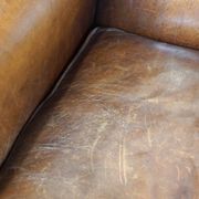 Fauteuil à oreilles particulièrement confortable en cuir de mouton, couleurs époustouflantes