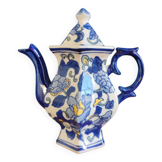 Cobalt blue teapot with flower pattern. Hexagonal teapot