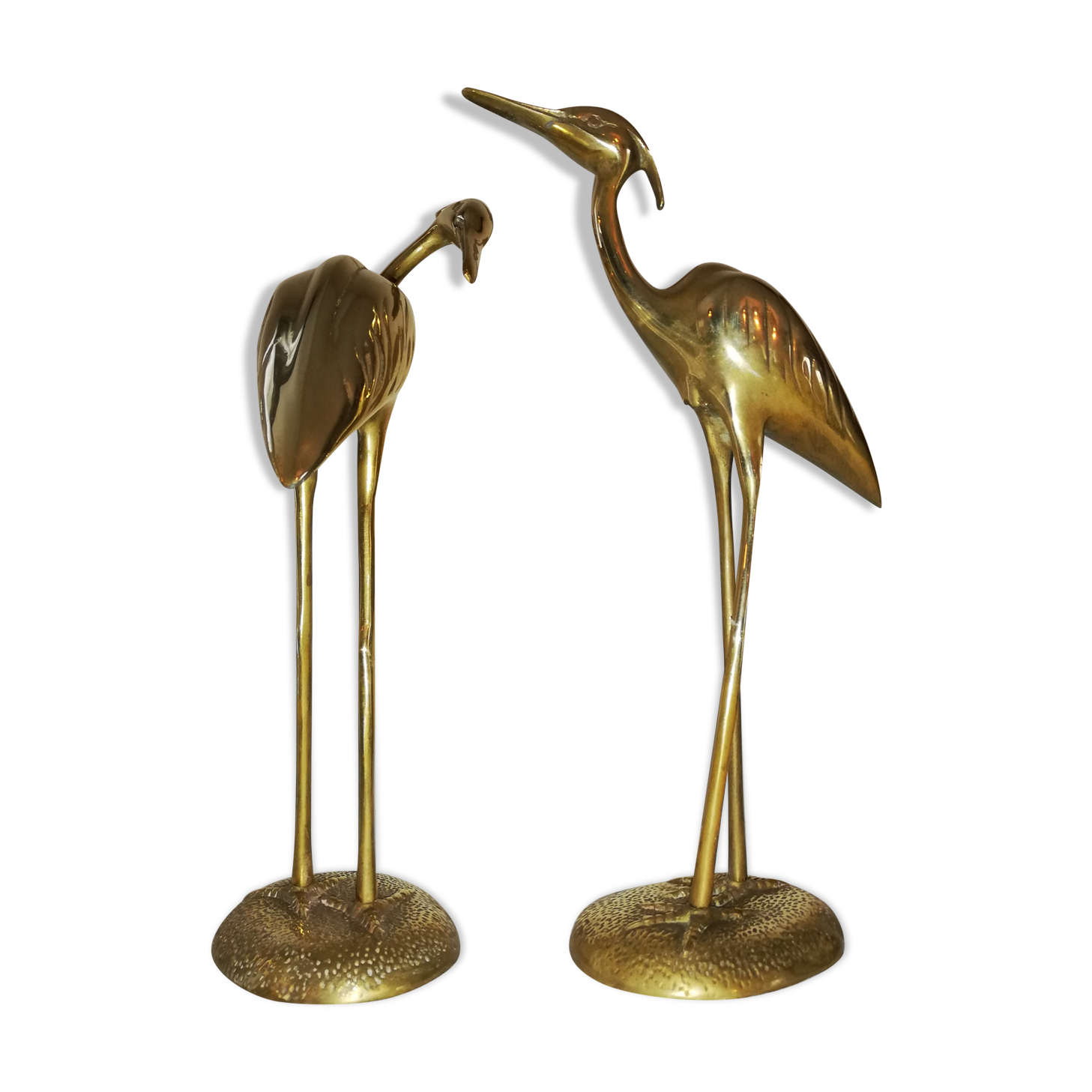 Couple of brass herons