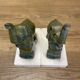 Pair of art deco bookends with elephant decoration in regulated and travertine, vintage