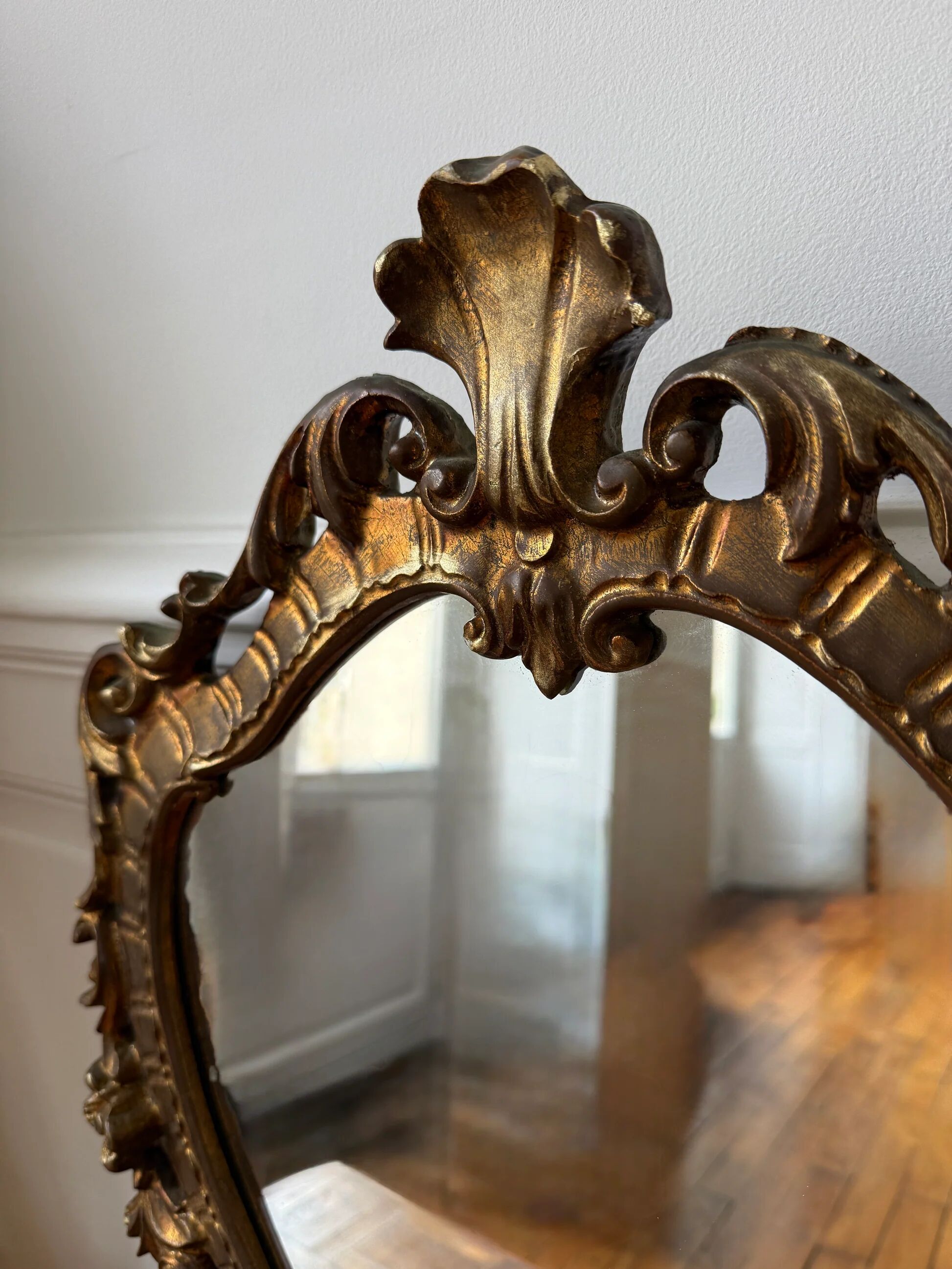 Golden rococo wall mirror