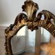 Golden rococo wall mirror