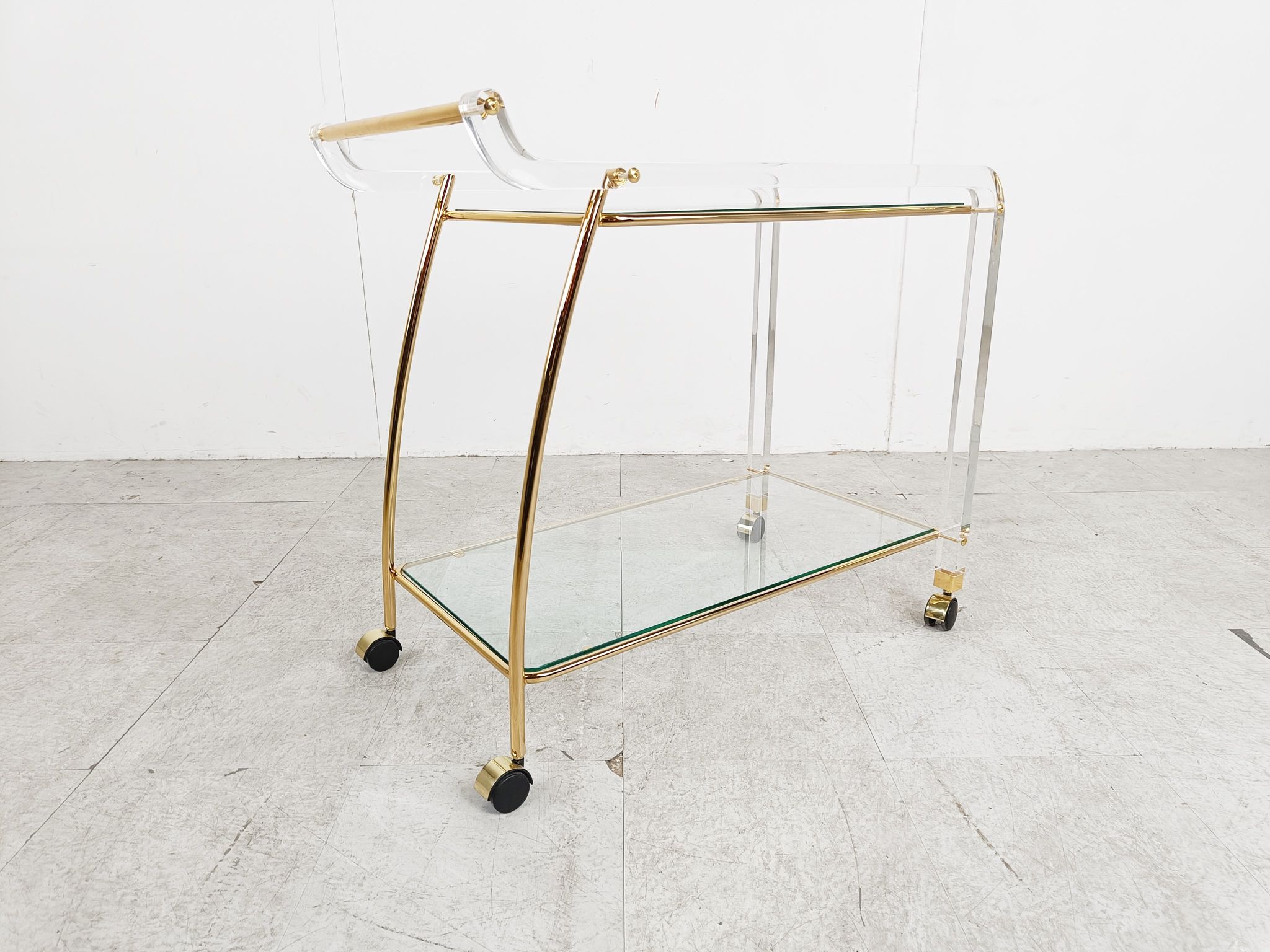 Brass and lucite drinks trolley, 1970s