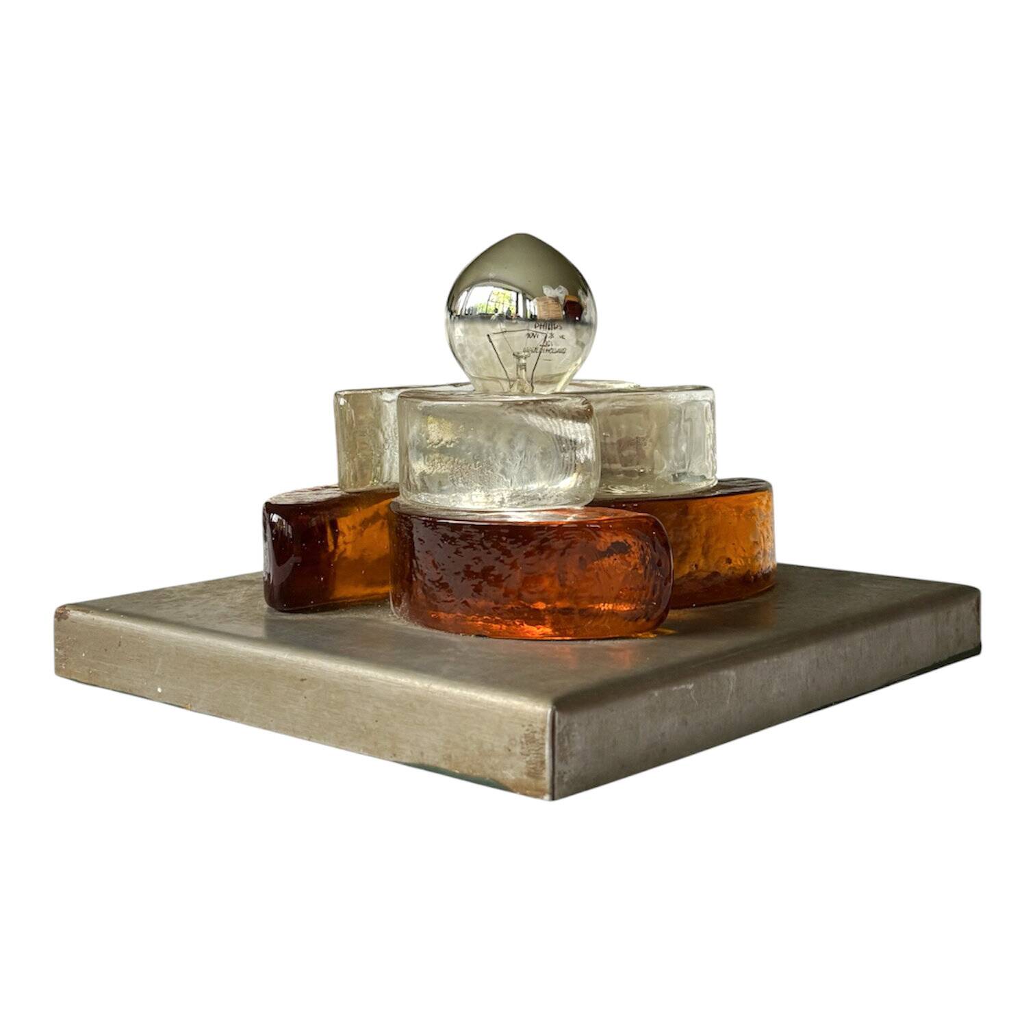 Pair of sculptural wall lights in moulded glass and metal