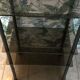 Service, TV stand on wheels in smoked glass Erard