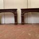 Pair of Louis XIV style fireplaces in red cherry marble. XIX century.