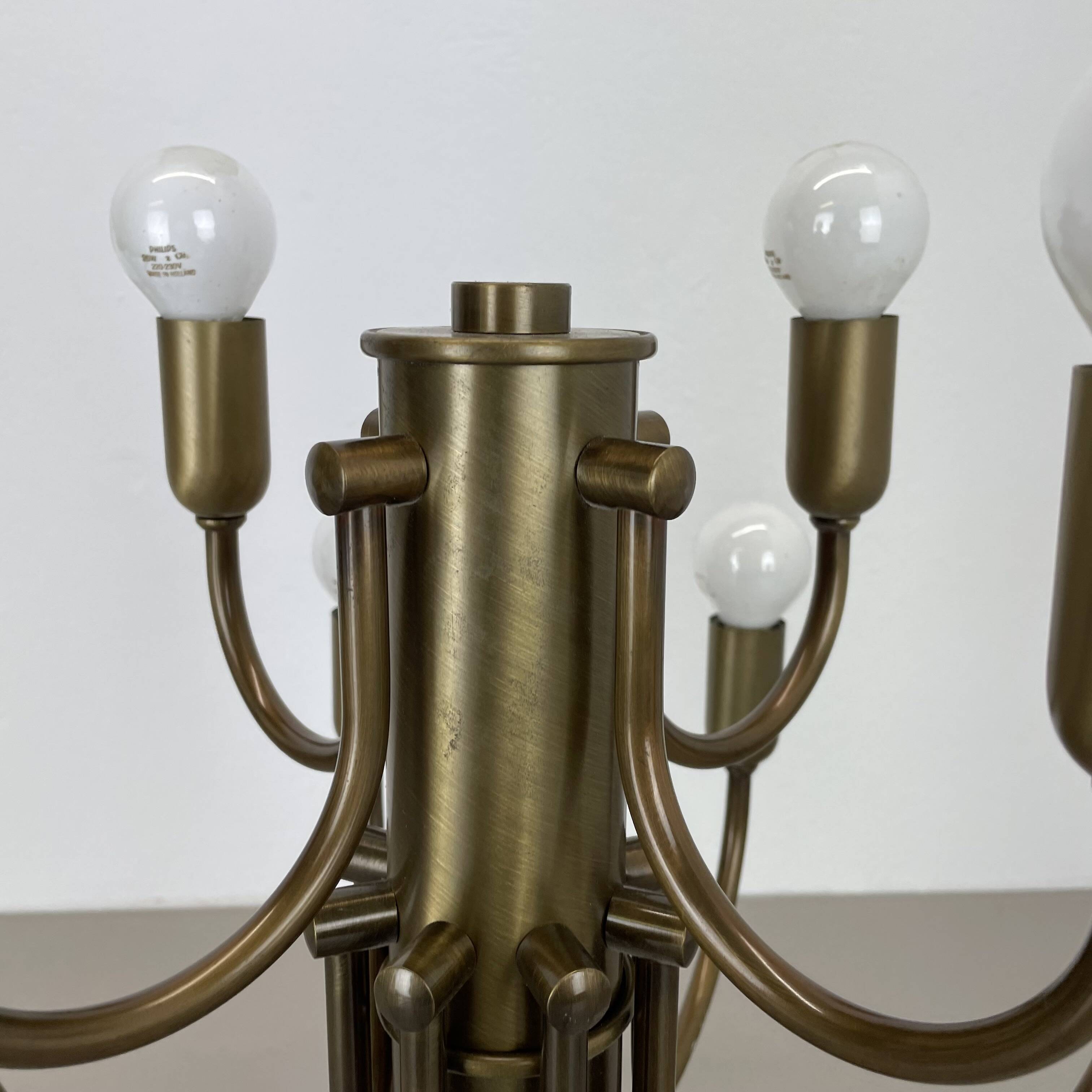 large 12-armed solid Brass ceiling light Chandelier by WKR Lights, Germany 1970s