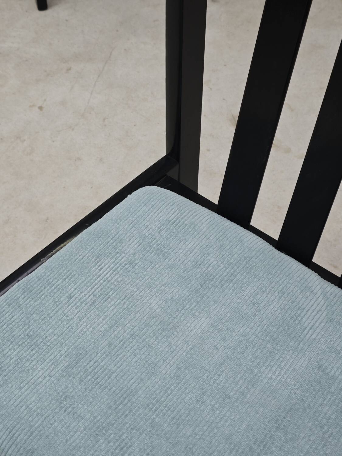 Set of 4 modernist black chairs with light blue ribbed fabric