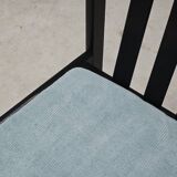 Set of 4 modernist black chairs with light blue ribbed fabric