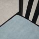 Set of 4 modernist black chairs with light blue ribbed fabric