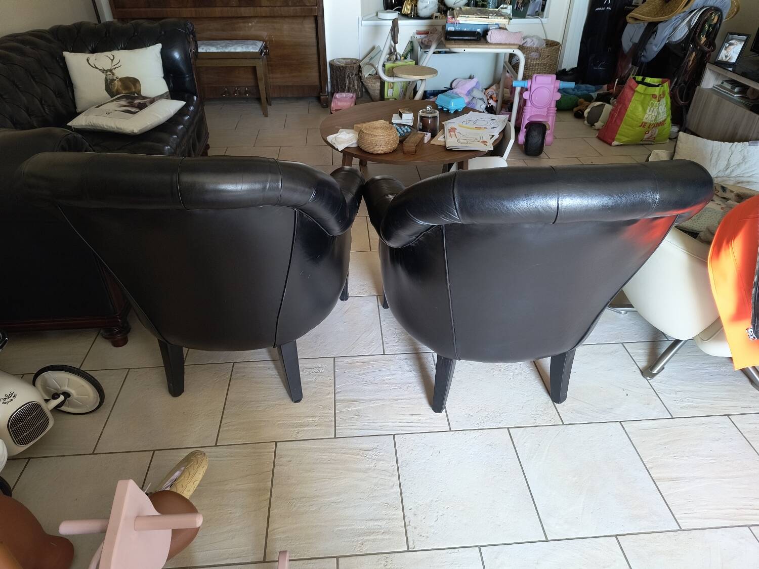 Two Chesterfield armchairs