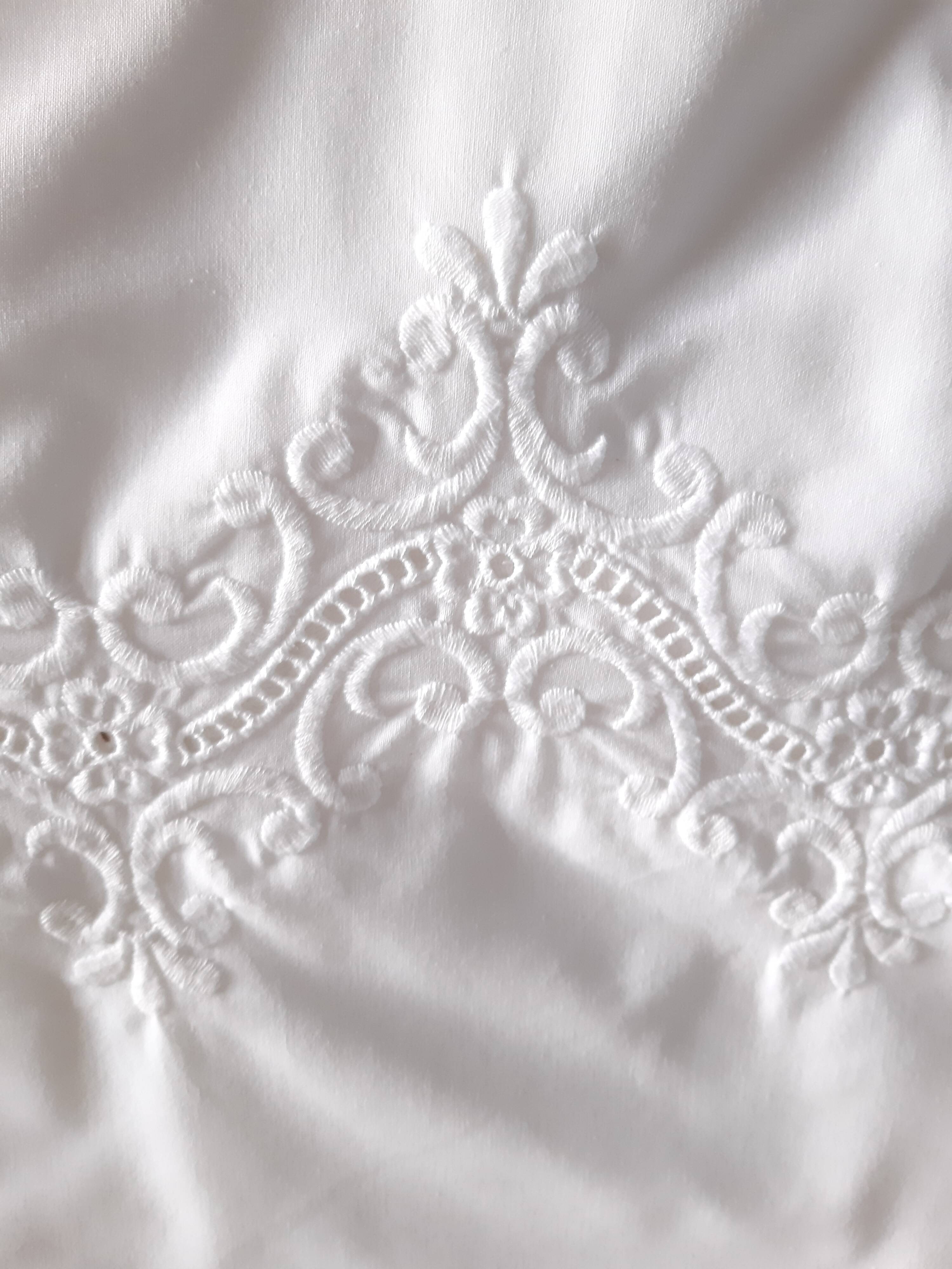 Embroidered tablecloth and 12 towels