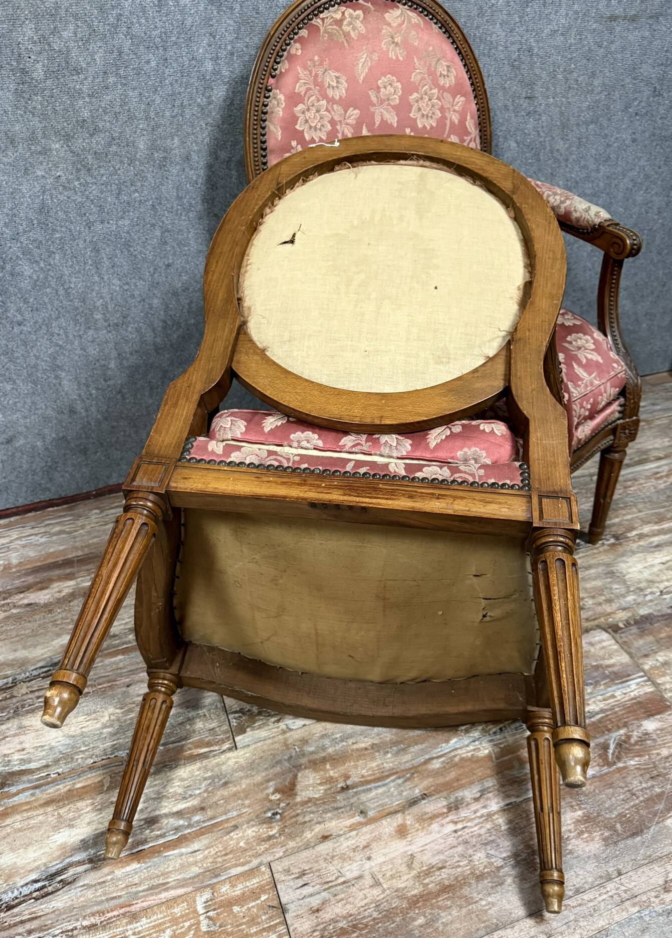 Pair of Louis XVI style armchairs in carved wood circa 1850