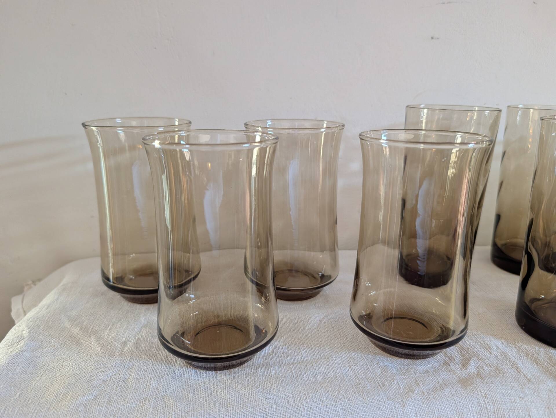 12 long drink glasses in smoked glass – 1970s