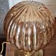 Globe table lamp in amber chiseled glass