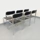 Set of 6 vintage Italian stackable chairs in chrome metal and faux leather.