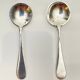 Pair of silver salt cellars and spoons