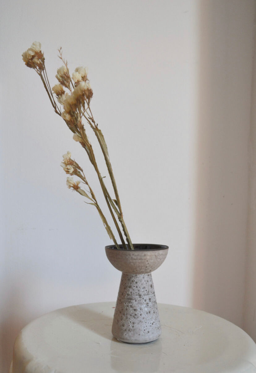 Minimalist gray ceramic vase in design shape