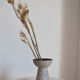 Minimalist gray ceramic vase in design shape