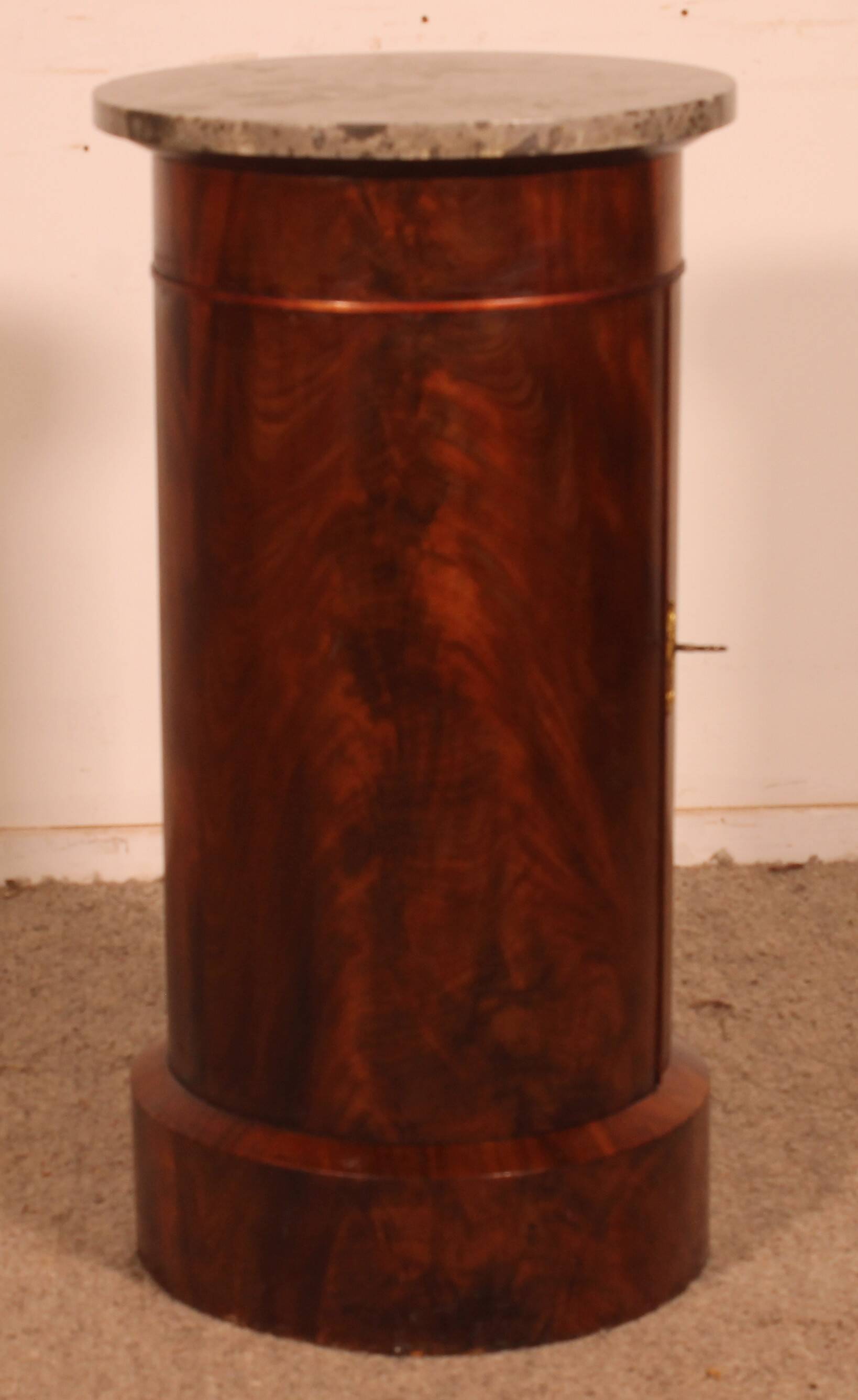 large Empire period flamed mahogany headboard.