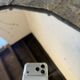 Brutalist round hammered gold metal mirror