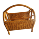 Vintage magazine holder in honey-colored rattan marrow