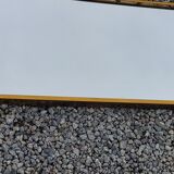 Mirror of the 70s in gilded metal, 60x35 cm