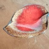 Empty red/iridescent beige pocket