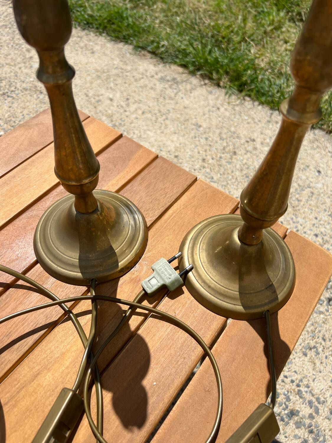 Two brass bedside lamps