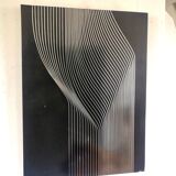 Vintage kinetic table on stainless steel plate