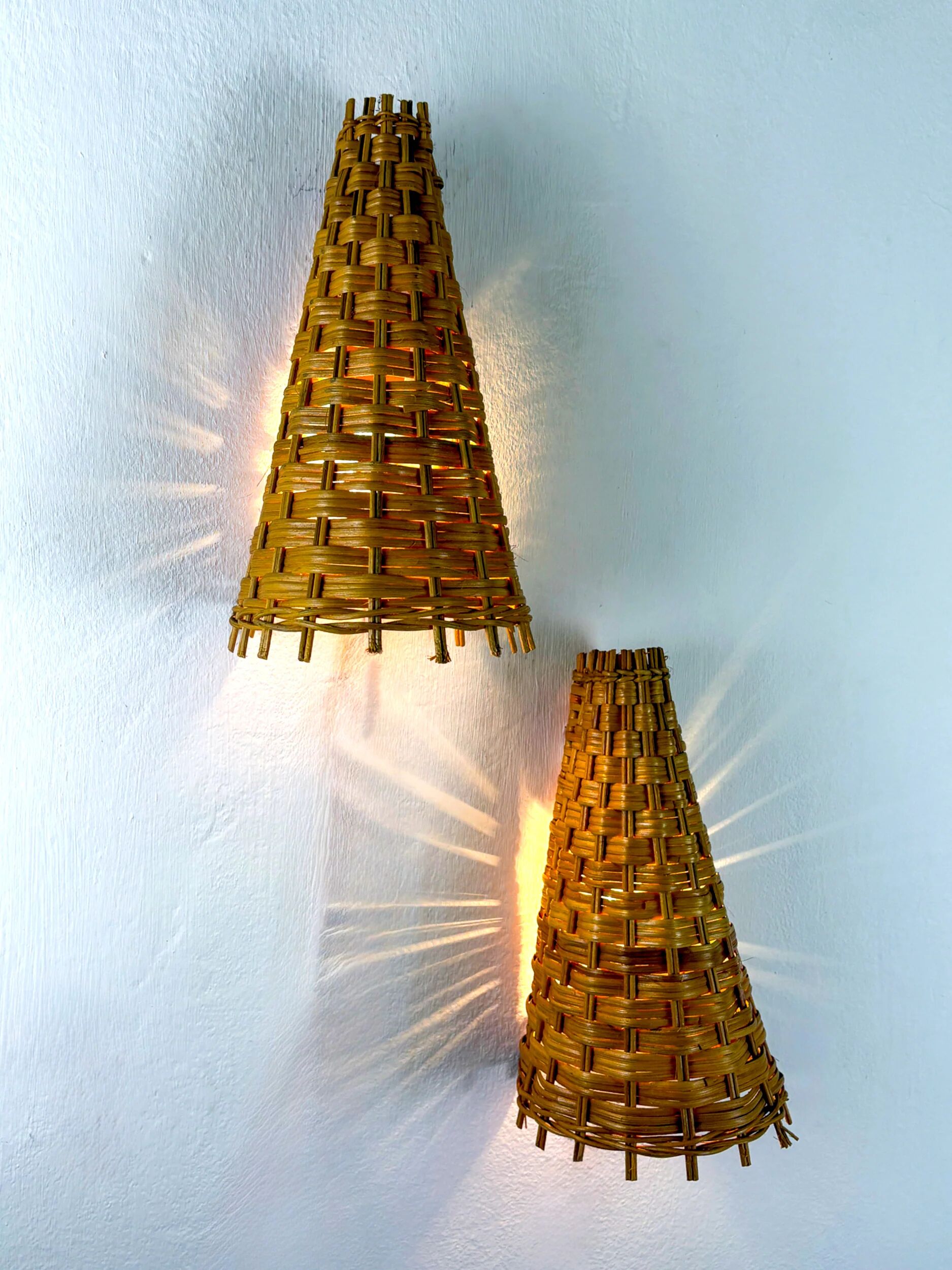 Pair of mid-century rattan wall shades, Italy, circa 1960s