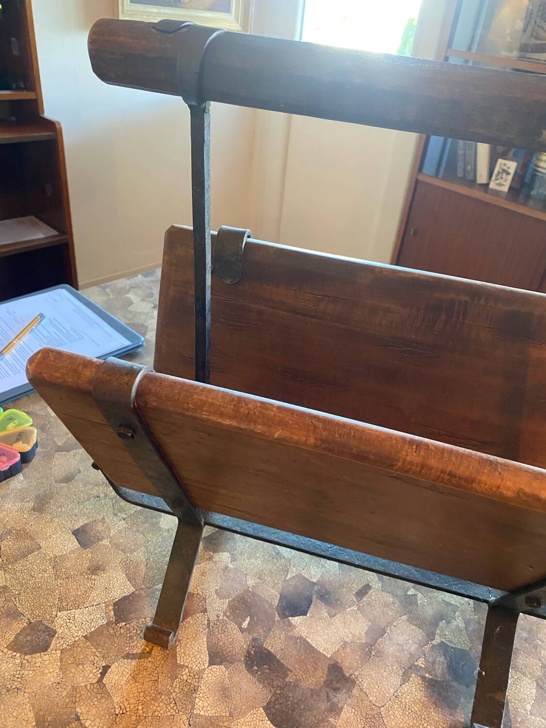 Vintage brutalist magazine rack.