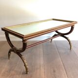 Coffee table in patinated and gilded carved wood with mirror top