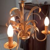 Vintage chandelier in golden metal