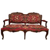 Louis XV style bench upholstered with petit point tapestry, early 19th century