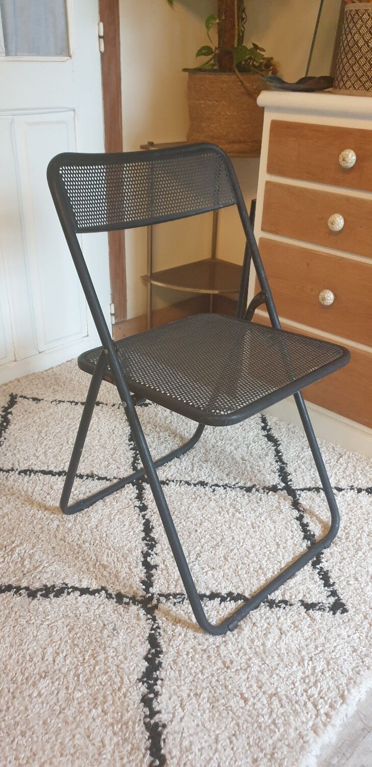 Pair of folding chairs in perforated metal