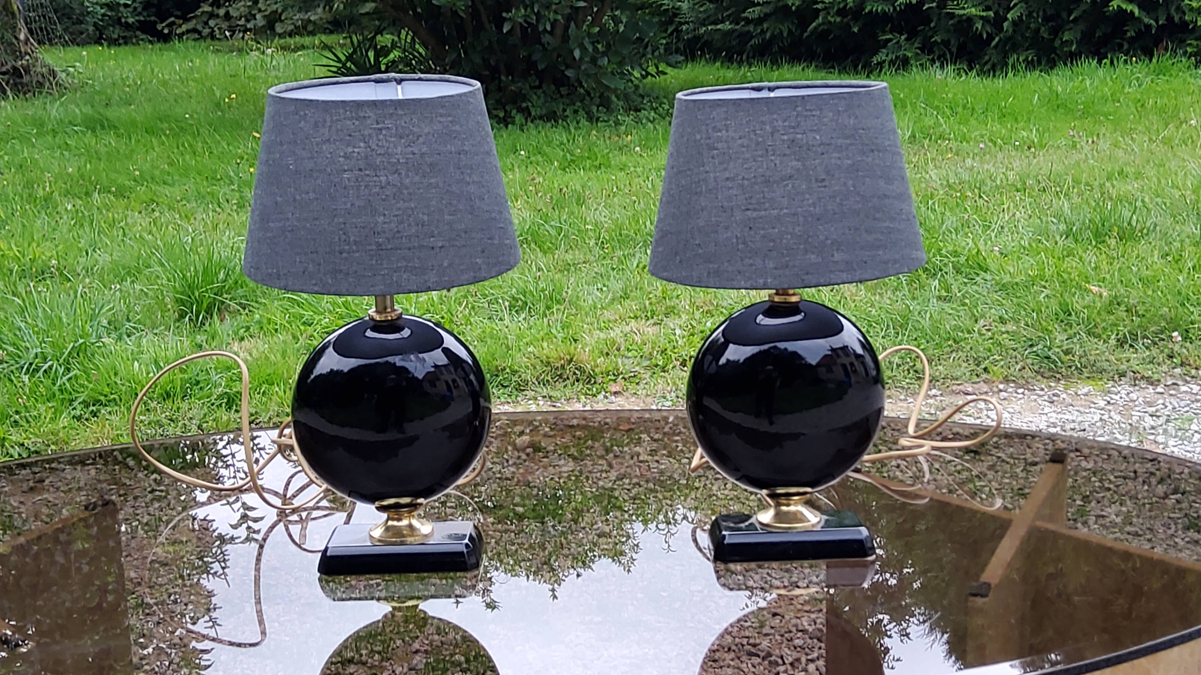 Pair of 70s designer lamps in black ceramic and gold metal