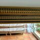 Large antique beveled mirror in the Napoleon III style - Gold and black frame