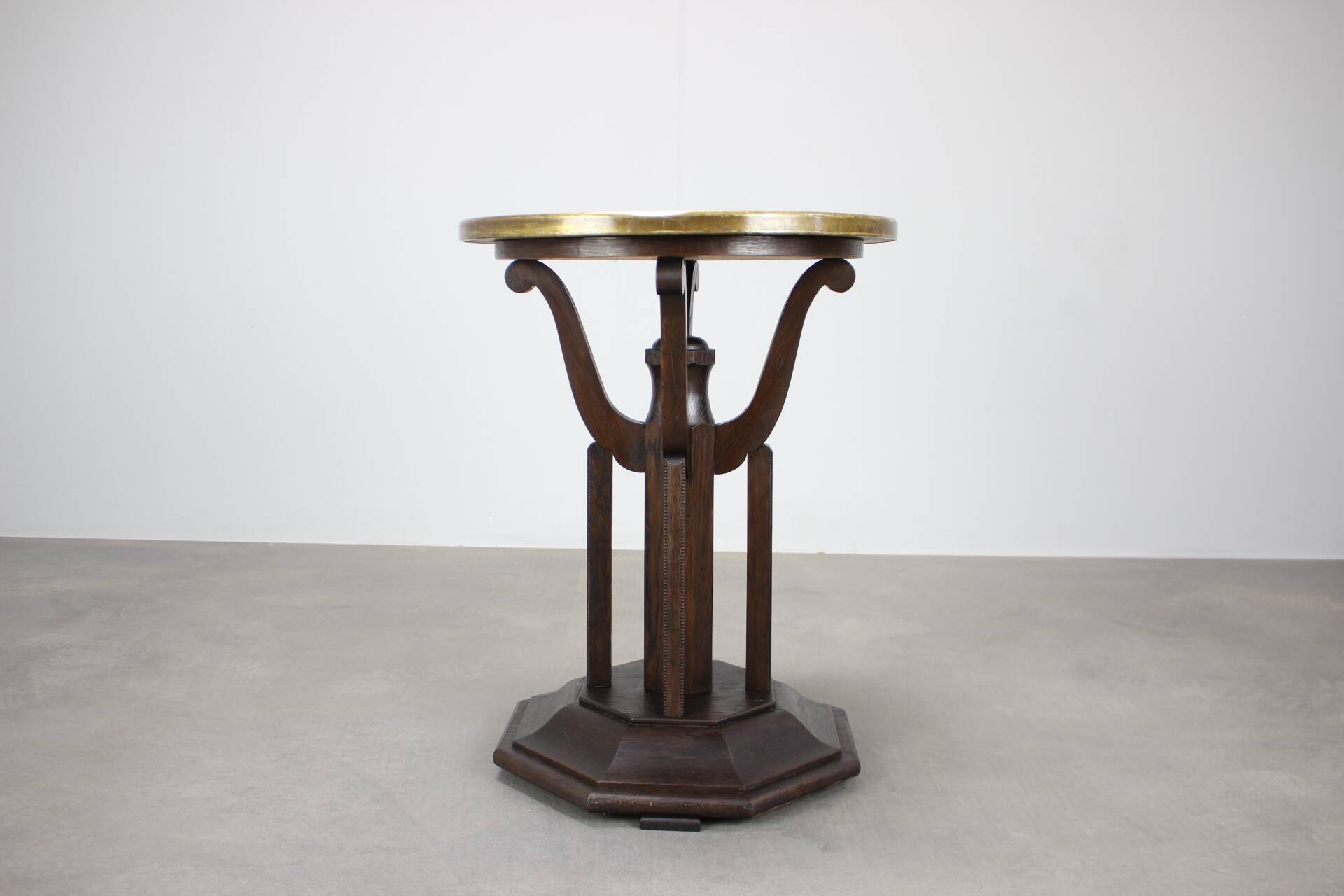 Art Deco chess table from the 1930s with a hand-decorated brass top and a stained oak base.