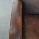 Vintage sheepskin leather design armchair in a dark cognac colour