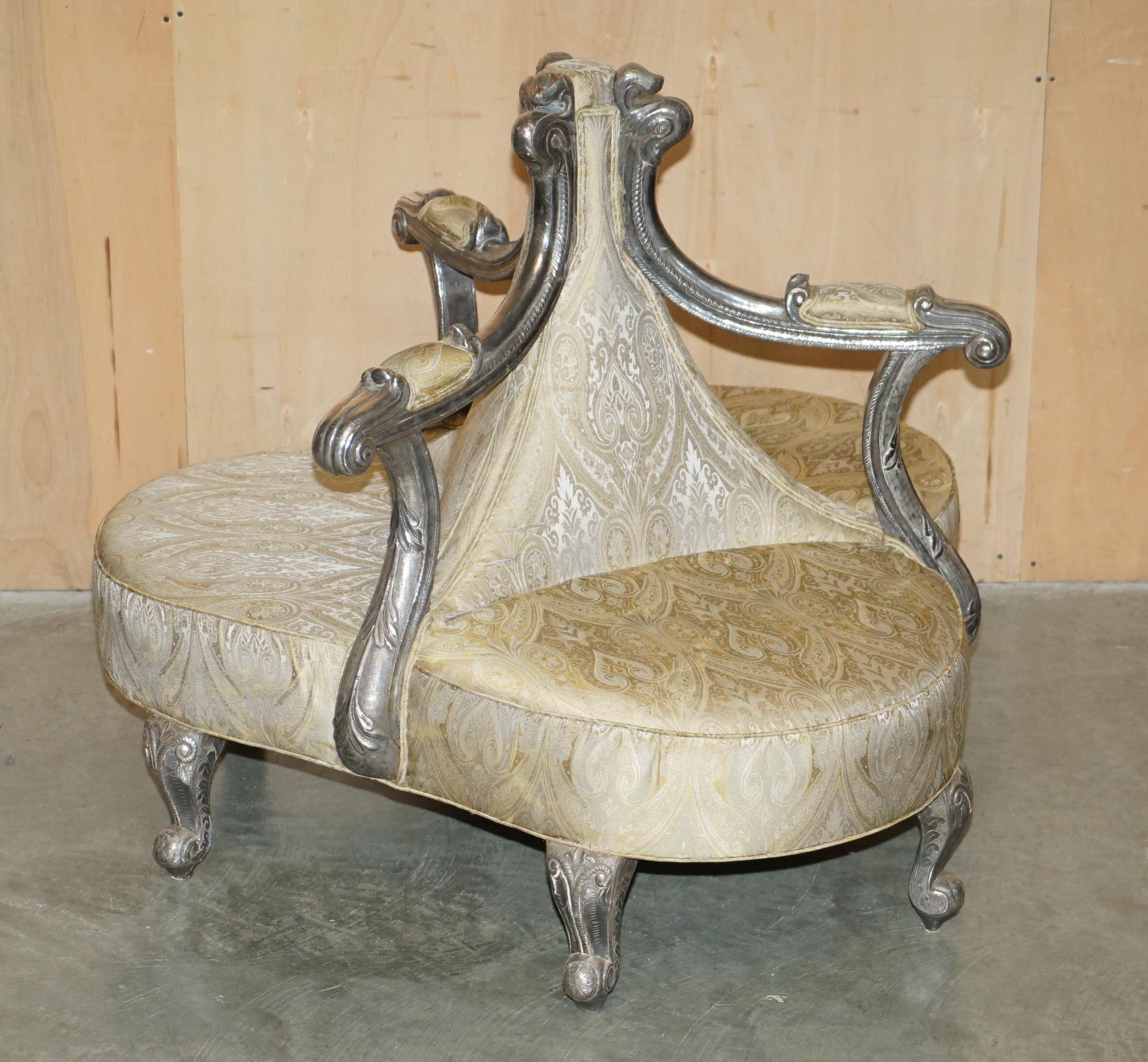 Silver-plated sculpted "Tete a Tete" canapé conversation, antique 19th century.