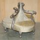 Silver-plated sculpted "Tete a Tete" canapé conversation, antique 19th century.