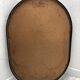 Brown plastic oval mirror, 1960s/1970s