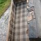 Old bulging wooden travel trunk