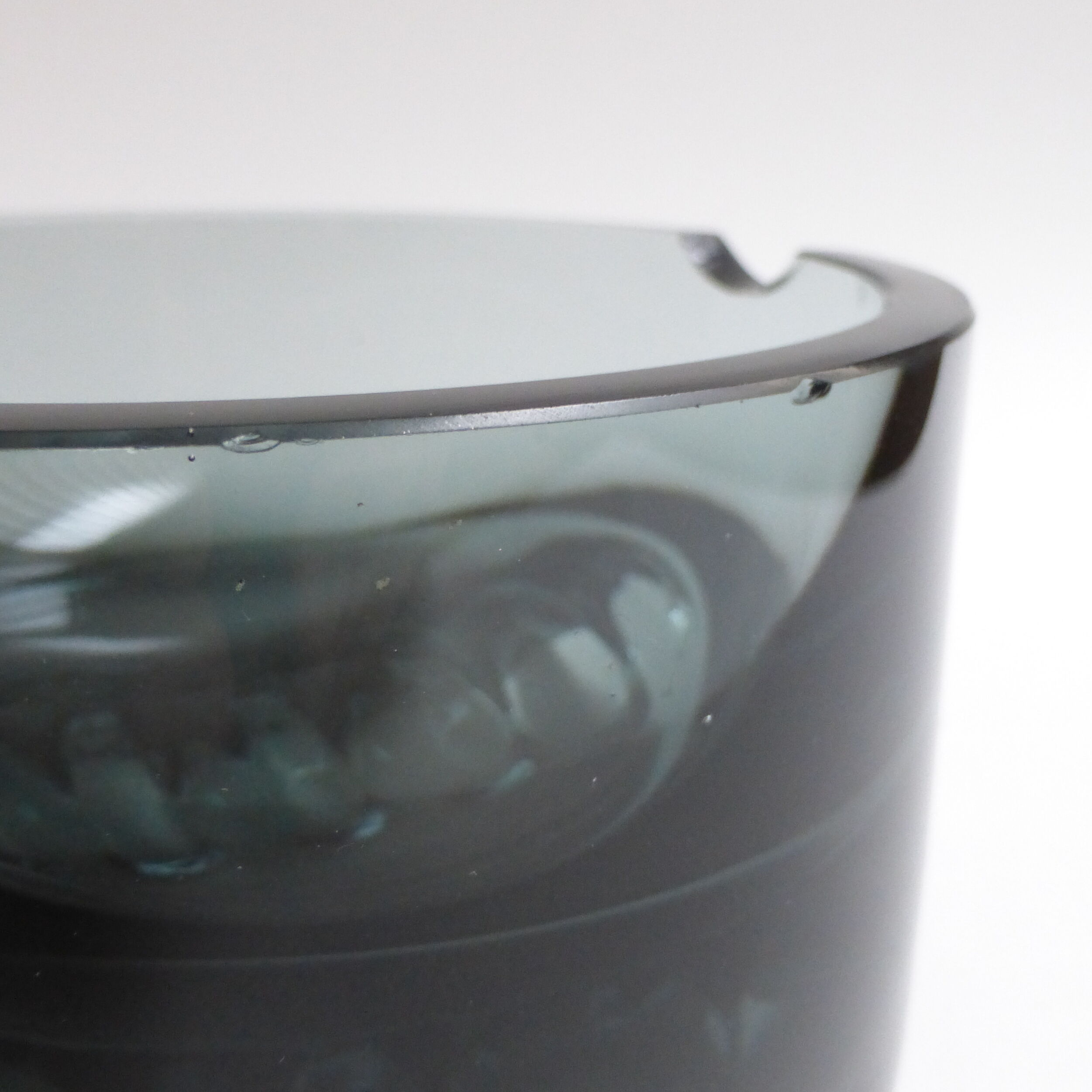 Scandinavian ashtray in 1970's moulded smoked glass